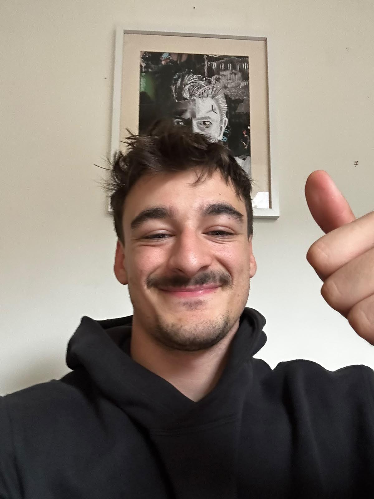Benji giving a thumbs-up